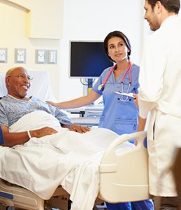 Hospital staff with patient