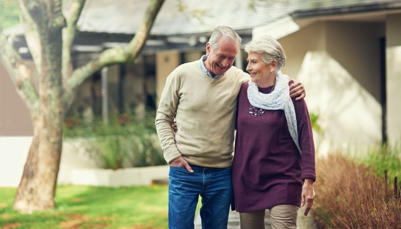 Shot of a loving senior couple taking a walk outside