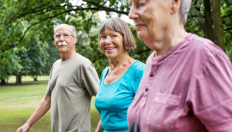 Shot of active and healthy senior people on a morning walk in park